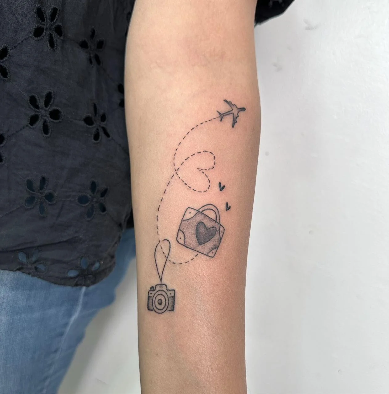 Geometric Tattoo Service - Fine Line Travel Tattoo Design in Bangalore