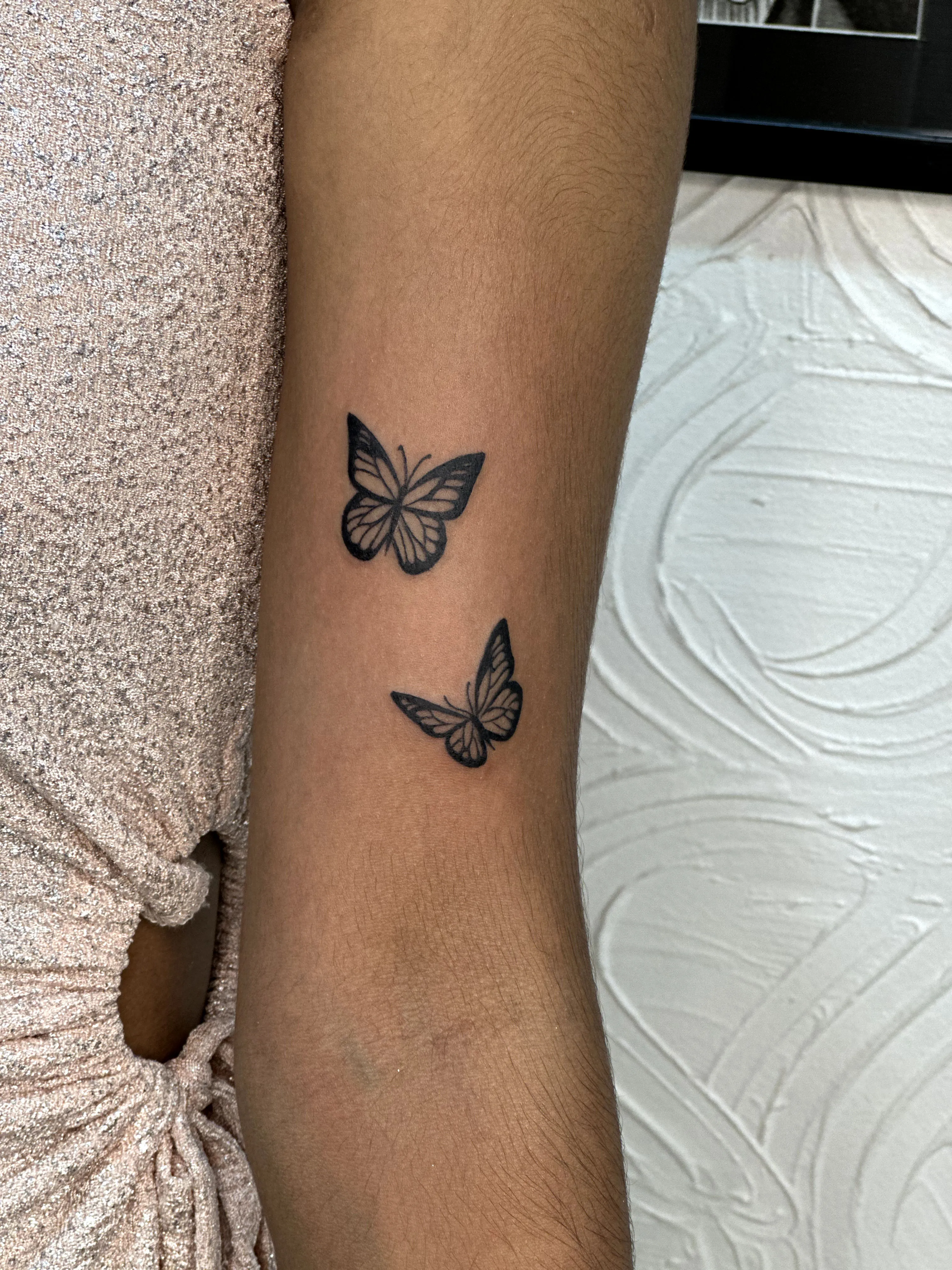 Minimalist Butterfly Tattoo